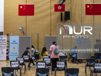 People waiting in line to get a jab of the Covid-19 Vaccine at a Vaccination Center on August 11, 2022 in Hong Kong, China. Hong Kong has re...