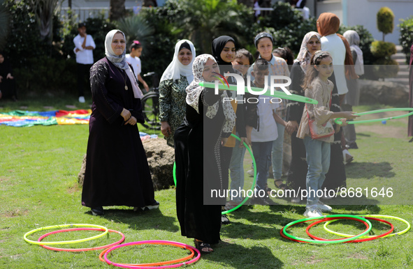 Palestinians participate in a fun day as part of community mental health programs after the latest conflict between Israel and Palestinian m...