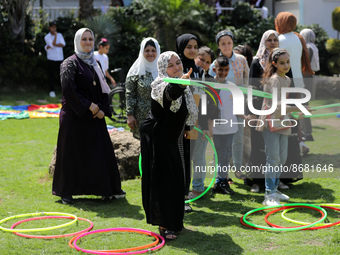 Palestinians participate in a fun day as part of community mental health programs after the latest conflict between Israel and Palestinian m...