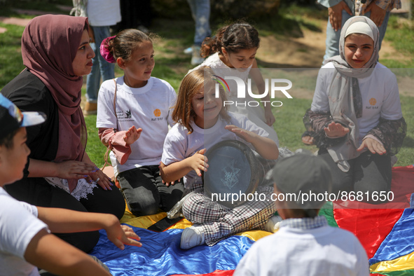 Palestinians participate in a fun day as part of community mental health programs after the latest conflict between Israel and Palestinian m...