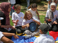 Palestinians participate in a fun day as part of community mental health programs after the latest conflict between Israel and Palestinian m...