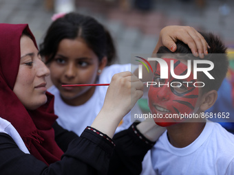 Palestinians participate in a fun day as part of community mental health programs after the latest conflict between Israel and Palestinian m...