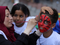 Palestinians participate in a fun day as part of community mental health programs after the latest conflict between Israel and Palestinian m...