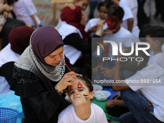 Palestinians participate in a fun day as part of community mental health programs after the latest conflict between Israel and Palestinian m...