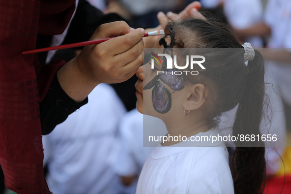 Palestinians participate in a fun day as part of community mental health programs after the latest conflict between Israel and Palestinian m...