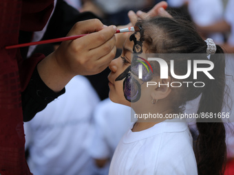 Palestinians participate in a fun day as part of community mental health programs after the latest conflict between Israel and Palestinian m...