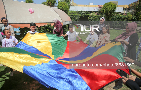 Palestinians participate in a fun day as part of community mental health programs after the latest conflict between Israel and Palestinian m...