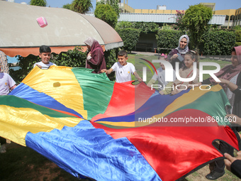 Palestinians participate in a fun day as part of community mental health programs after the latest conflict between Israel and Palestinian m...