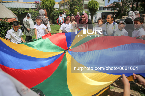 Palestinians participate in a fun day as part of community mental health programs after the latest conflict between Israel and Palestinian m...