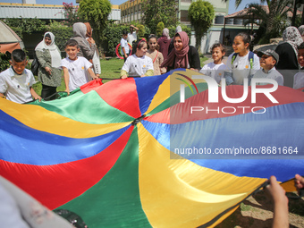 Palestinians participate in a fun day as part of community mental health programs after the latest conflict between Israel and Palestinian m...