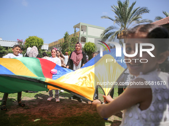 Palestinians participate in a fun day as part of community mental health programs after the latest conflict between Israel and Palestinian m...