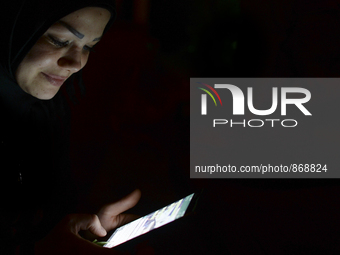 A Syrian lady pictured outside the Aspa Boomerang Restaurant in Kos harbour, as awaiting to enter to the restaurant. 
The restaurant owner,...