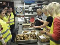 Michael Pastrikos (third from the left), the Aspa Boomerang Restaurant owner, helped by his family members, his staff and many international...