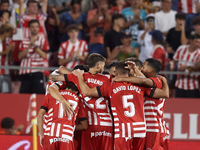 Girona players celebrate their second goal during the La Liga Santander match between Girona FC and Getafe CF at Montilivi Stadium on August...