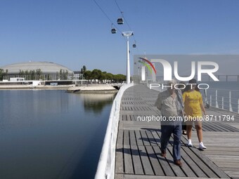 People are seen performing outdoor activities in the surroundings of the Tejo river promenade in Oriente. Lisbon, August 23, 2022. Portugal...