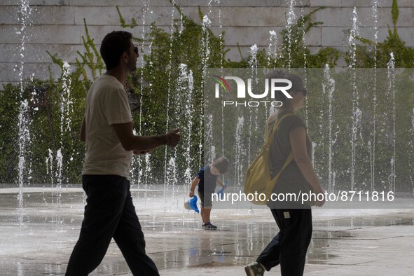 People are seen performing outdoor activities in the surroundings of the Tejo river promenade in Oriente. Lisbon, August 23, 2022. Portugal...