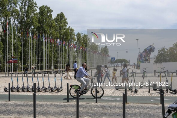 People are seen performing outdoor activities in the surroundings of the Tejo river promenade in Oriente. Lisbon, August 23, 2022. Portugal...