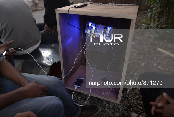 A charging point set up for migrants in Kos camp, near the main Police station, as hundreds of new arrived migrants awaiting on a daily basi...