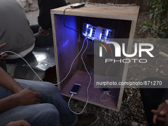 A charging point set up for migrants in Kos camp, near the main Police station, as hundreds of new arrived migrants awaiting on a daily basi...