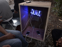A charging point set up for migrants in Kos camp, near the main Police station, as hundreds of new arrived migrants awaiting on a daily basi...