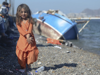 A young Fariba (age 3) from Afganistan, 
pictured in Kos harbour when her family awaiting to be processed by the Greek police and given pape...