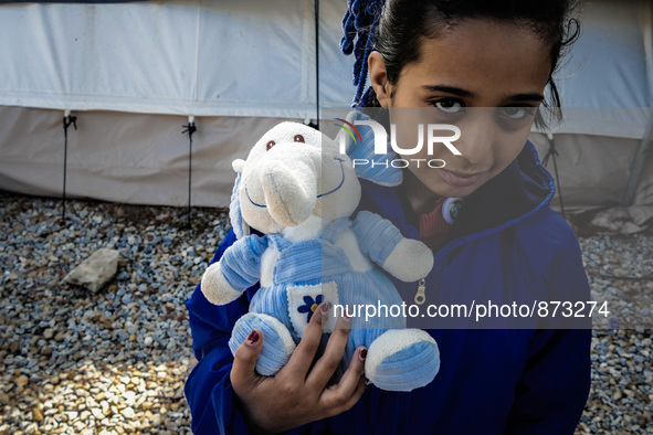 A migrant girl in a camp in Kos, Greece, on October 27, 2015. More than 700,000 refugees and migrants have reached Europe's Mediterranean sh...