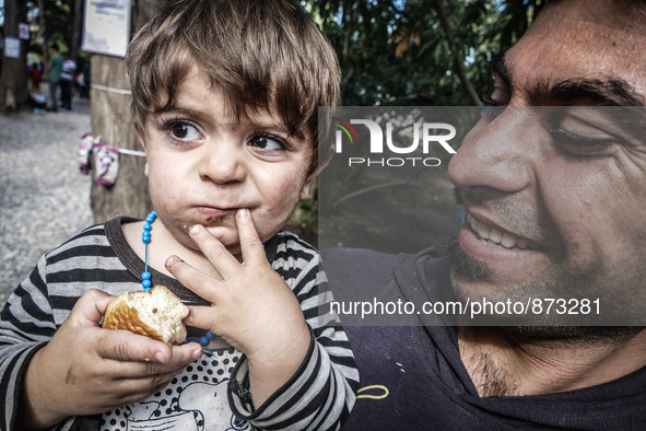 A child in a camp on October 27, 2015, in Kos, Greece. More than 700,000 refugees and migrants have reached Europe's Mediterranean shores so...