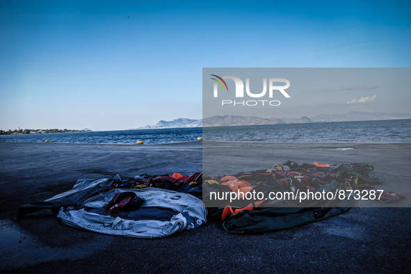 The once pristine coastline of the Greek island of Kos is littered with life jackets, water bottles and dinghies, on October 27, 2015. More...