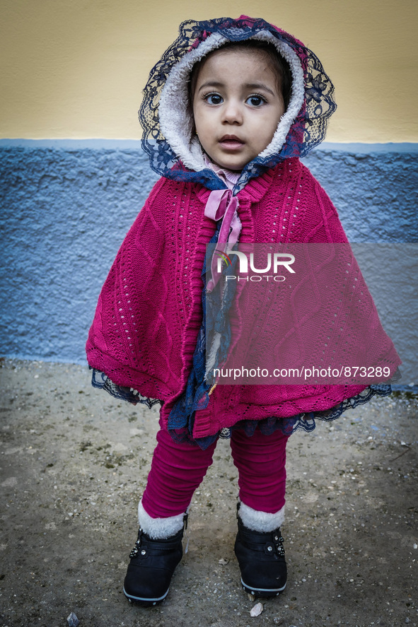 A migrant girl in a camp in Kos, Greece, on October 27, 2015. More than 700,000 refugees and migrants have reached Europe's Mediterranean sh...