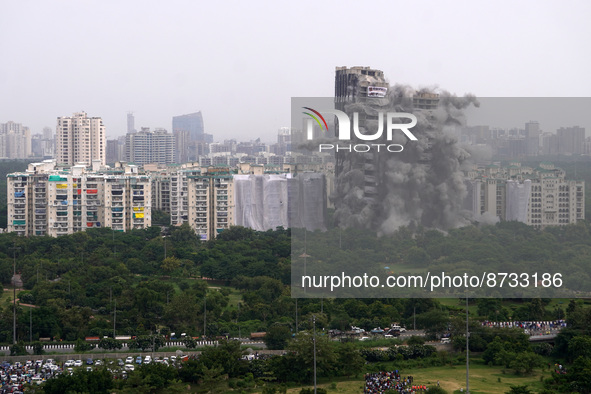 The Supertech Twin Towers collapse following a controlled demolition by explosion after the Supreme Court found them in violation of buildin...