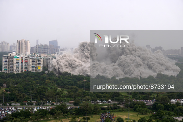 The Supertech Twin Towers collapse making a cloud of dust following a controlled demolition by explosion after the Supreme Court found them...