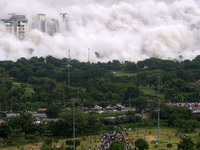 The Supertech Twin Towers collapse making a cloud of dust following a controlled demolition by explosion after the Supreme Court found them...