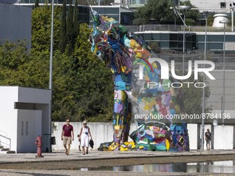 People are seen performing outdoor activities in the surroundings of the Tejo river promenade in Oriente. Lisbon, August 23, 2022. The manda...