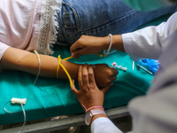 Dengue-infected patients are treated in the premises of the government hospital in Kathmandu, Nepal on August 29, 2022. The number of dengue...