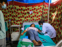 Dengue-infected patients are treated in the premises of the government hospital in Kathmandu, Nepal on August 29, 2022. The number of dengue...