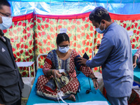 Dengue-infected patients are treated in the premises of the government hospital in Kathmandu, Nepal on August 29, 2022. The number of dengue...