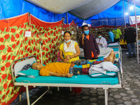 Dengue-infected patients are treated in the premises of the government hospital in Kathmandu, Nepal on August 29, 2022. The number of dengue...