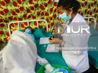 Dengue-infected patients are treated in the premises of the government hospital in Kathmandu, Nepal on August 29, 2022. The number of dengue...