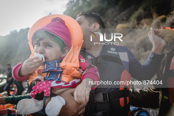 A child crying, in Lesbos, Greece, on September 29, 2015. More than 700,000 refugees and migrants have reached Europe's Mediterranean shores...