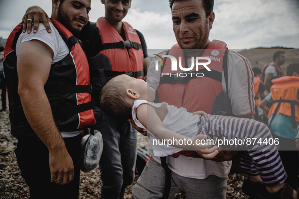 A child crying, in Lesbos, Greece, on September 26, 2015. More than 700,000 refugees and migrants have reached Europe's Mediterranean shores...