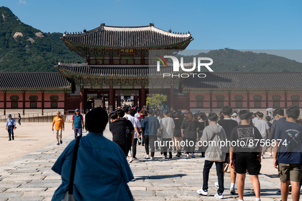 High school students enter Gyeongbokgung Palace for a school trip on September 1st, 2022 in Seoul, South Korea. The government will suspend...