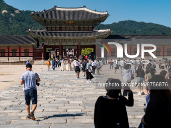 High school students enter Gyeongbokgung Palace for a school trip on September 1st, 2022 in Seoul, South Korea. The government will suspend...