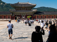 High school students enter Gyeongbokgung Palace for a school trip on September 1st, 2022 in Seoul, South Korea. The government will suspend...