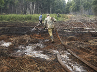 Rescuers are extinguishing Peat soil fires near the village of Sosnivka in the Kyiv Region, Ukraine September 6, 2022 (