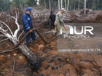 Rescuers are extinguishing Peat soil fires near the village of Sosnivka in the Kyiv Region, Ukraine September 6, 2022 (