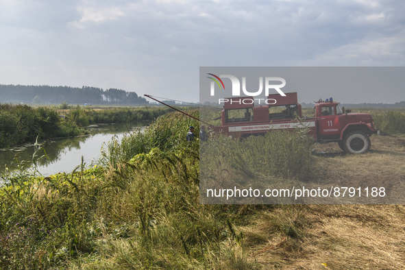 Rescuers are extinguishing Peat soil fires near the village of Sosnivka in the Kyiv Region, Ukraine September 6, 2022 