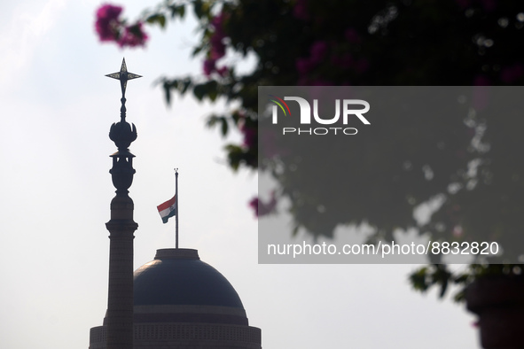 The Indian national flag flies half-mast at Rashtrapati Bhavan, home to the President of the world's largest democracy, as India observes on...