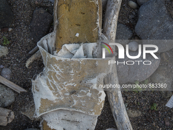 Woman's slip on shoe found near Eftalou on the island of Lesbos.  Shoes found on the beaches and around the Greek island where thousands of...