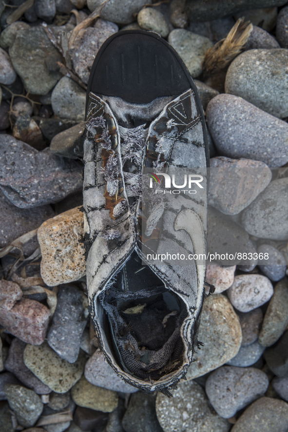 Nike basketball sneaker found near Eftalou on the island of Lesbos.  Shoes found on the beaches and around the Greek island where thousands...