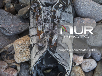 Nike basketball sneaker found near Eftalou on the island of Lesbos.  Shoes found on the beaches and around the Greek island where thousands...